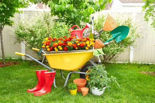 Gardener pruning shrubs in West Ham