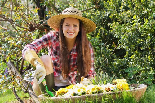 Homeowner adjusting mowing schedule in spring